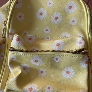 Cute brand new mini backpack great for a gift or teenager..